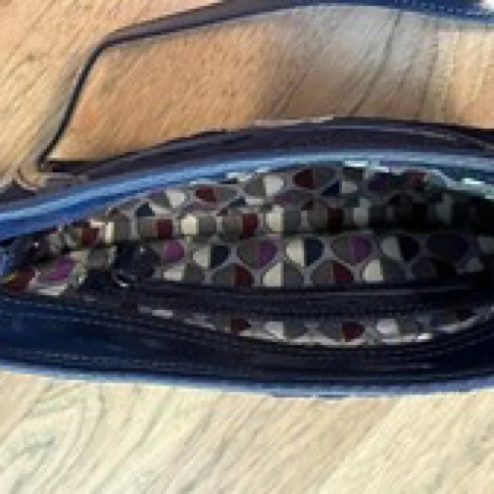 Vera Bradley Trapeze Quilted Crossbody with Patent Leather Trim Navy Blue - Picture 7 of 7